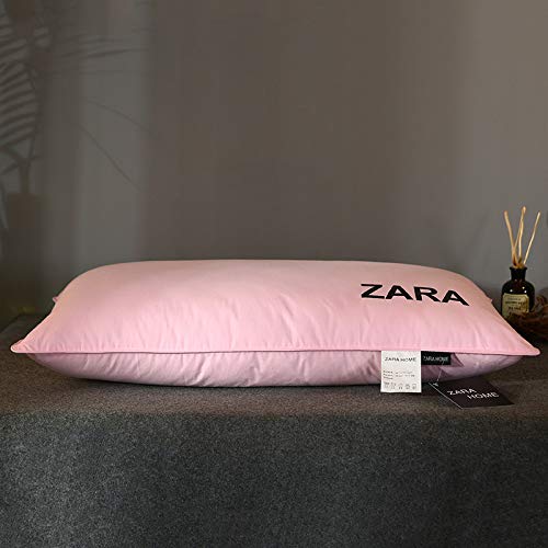 Imagen Almohada de plumas blancas suave y comoda para un descanso perfecto